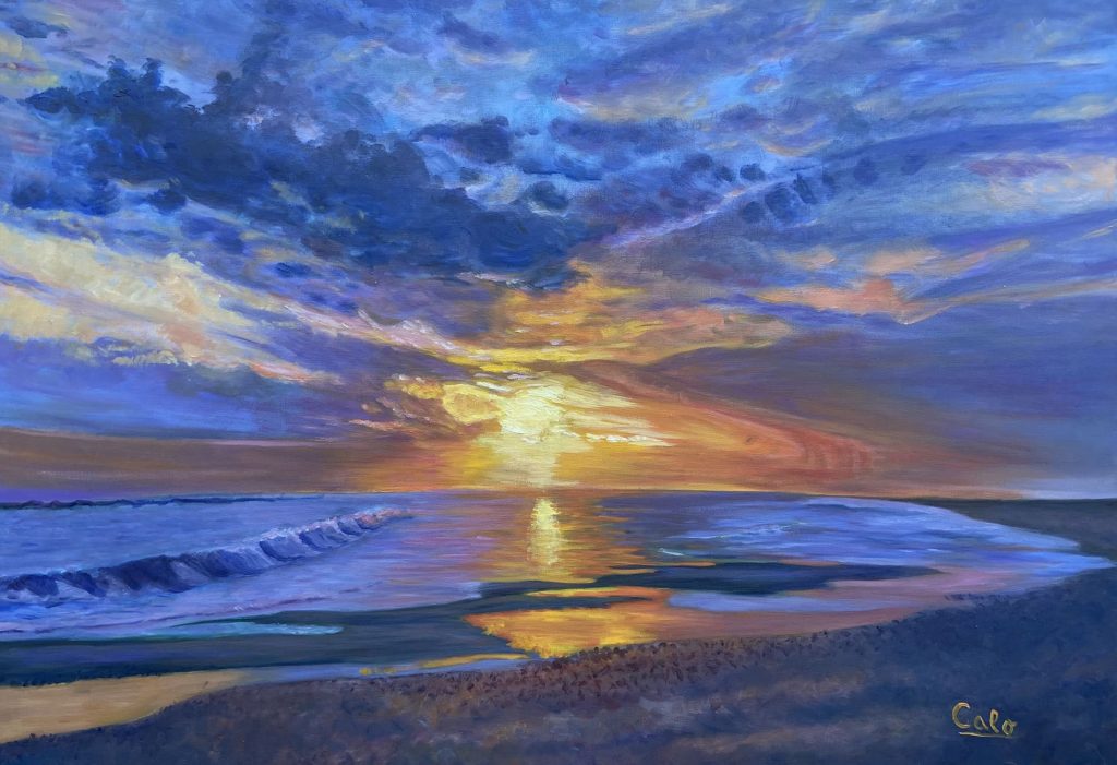 Santalu cae el sol en el mar